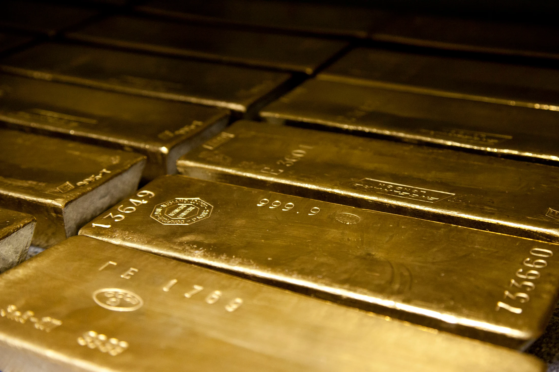 Photograph of real cast gold bullion bars in their natural gold colour